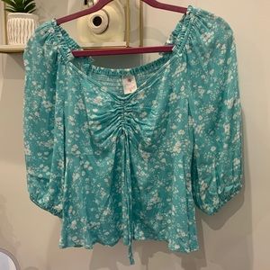Teal and white, floral, elbow sleeved shirt